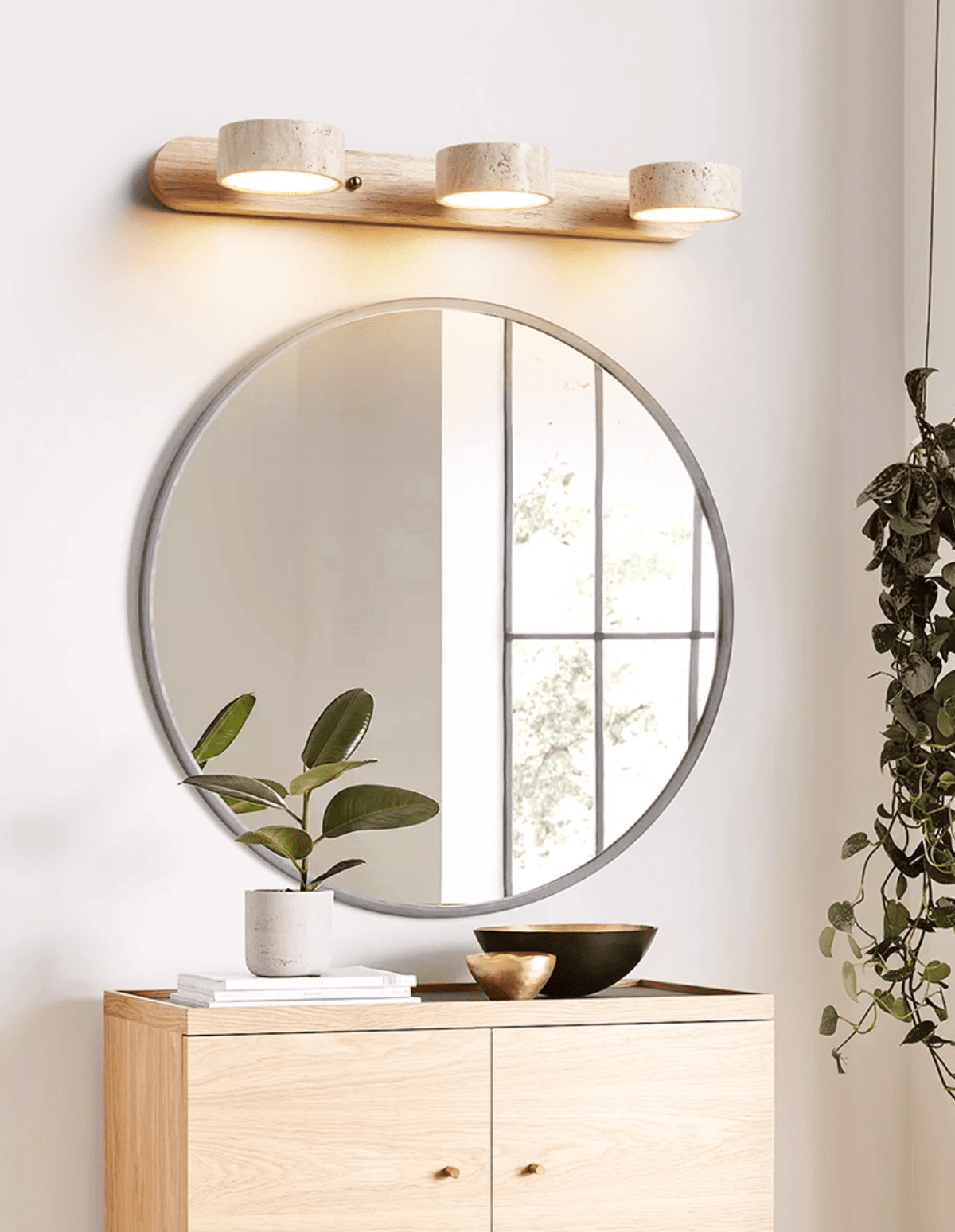 Travertine wall sconce with dimmable LED and natural wood accent by Moktan Sabai, warm glow on Tampa Home & Garden Store