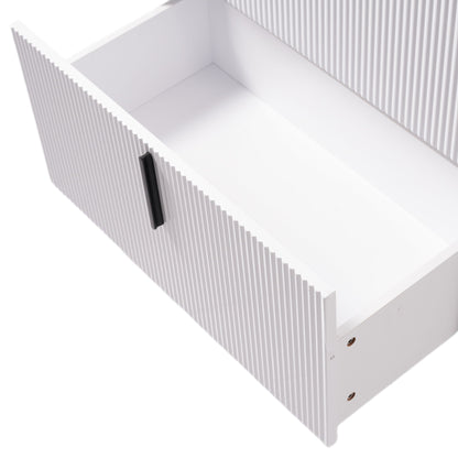 Bathroom vanity with fluted white cabinet panels and dark metal handle on Tampa Home & Garden Store
