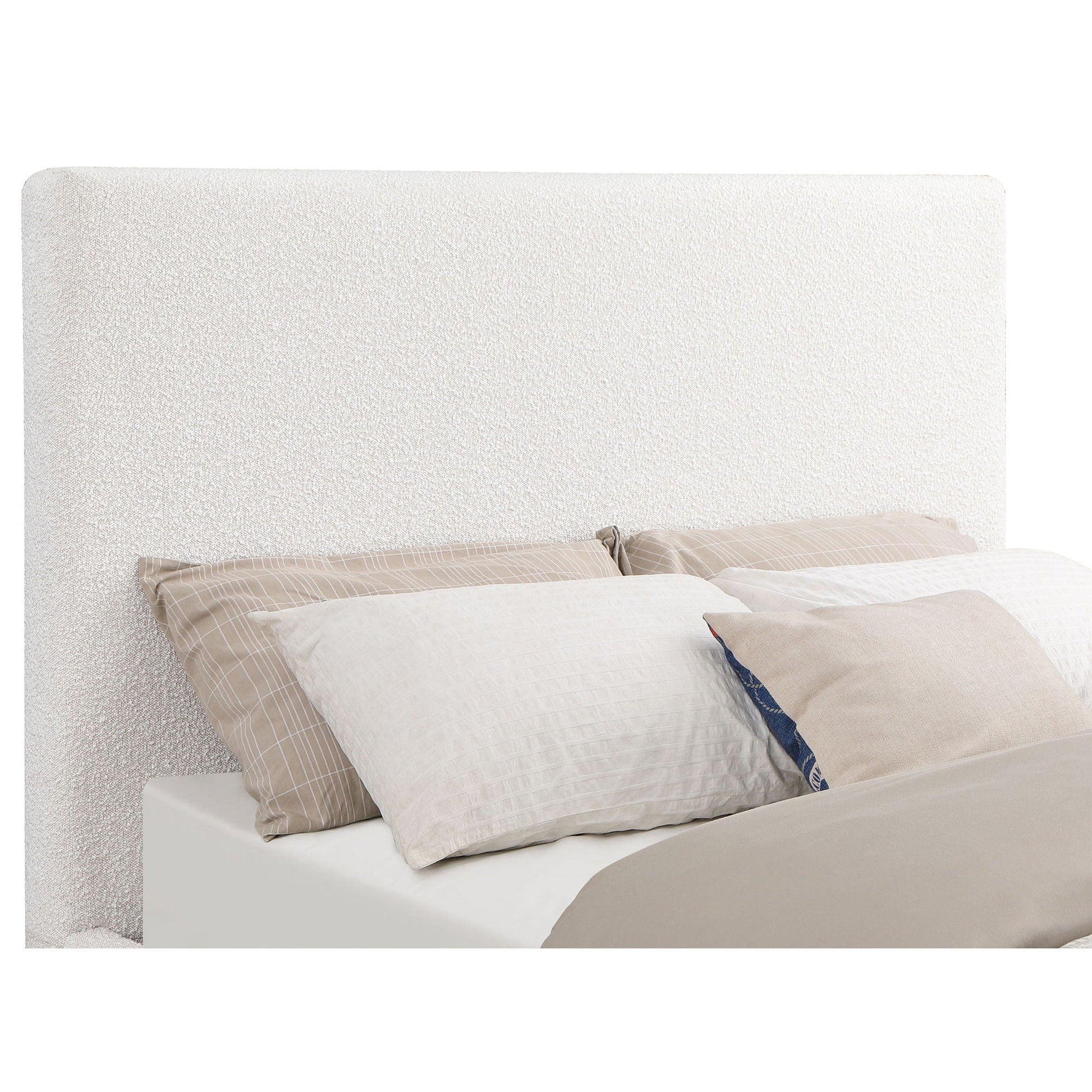 Othello platform bed in cream upholstery with beige bedding on Tampa Home & Garden Store