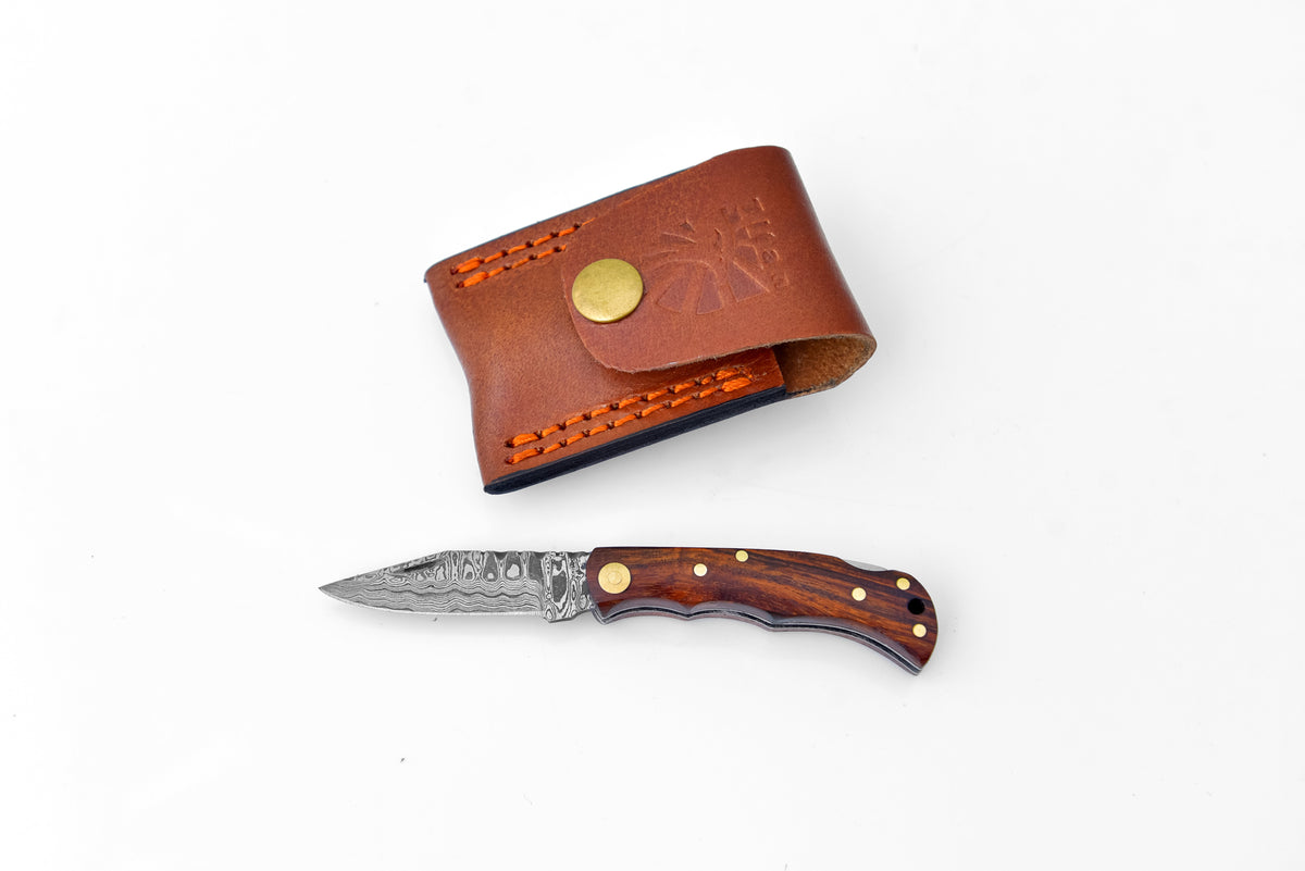 TF-003 Damascus steel knife with wooden handle; tan leather sheath with orange stitching on Tampa Home & Garden Store