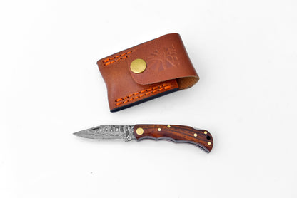 TF-003 Damascus steel knife with wooden handle; tan leather sheath with orange stitching on Tampa Home & Garden Store