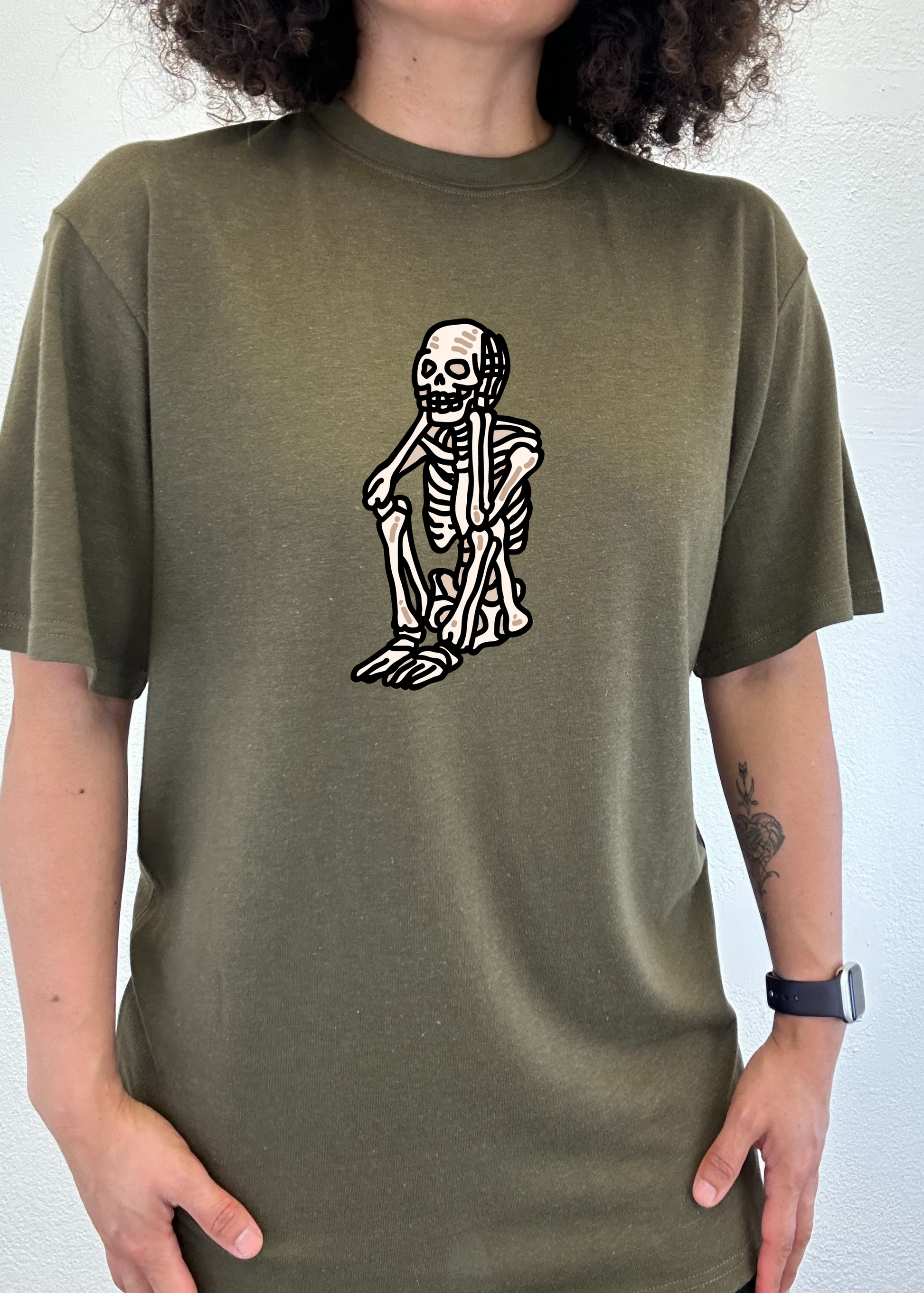 Sad Skeleton Halloween unisex bamboo viscose/organic cotton short sleeve graphic T-shirt olive on Tampa Home & Garden Store