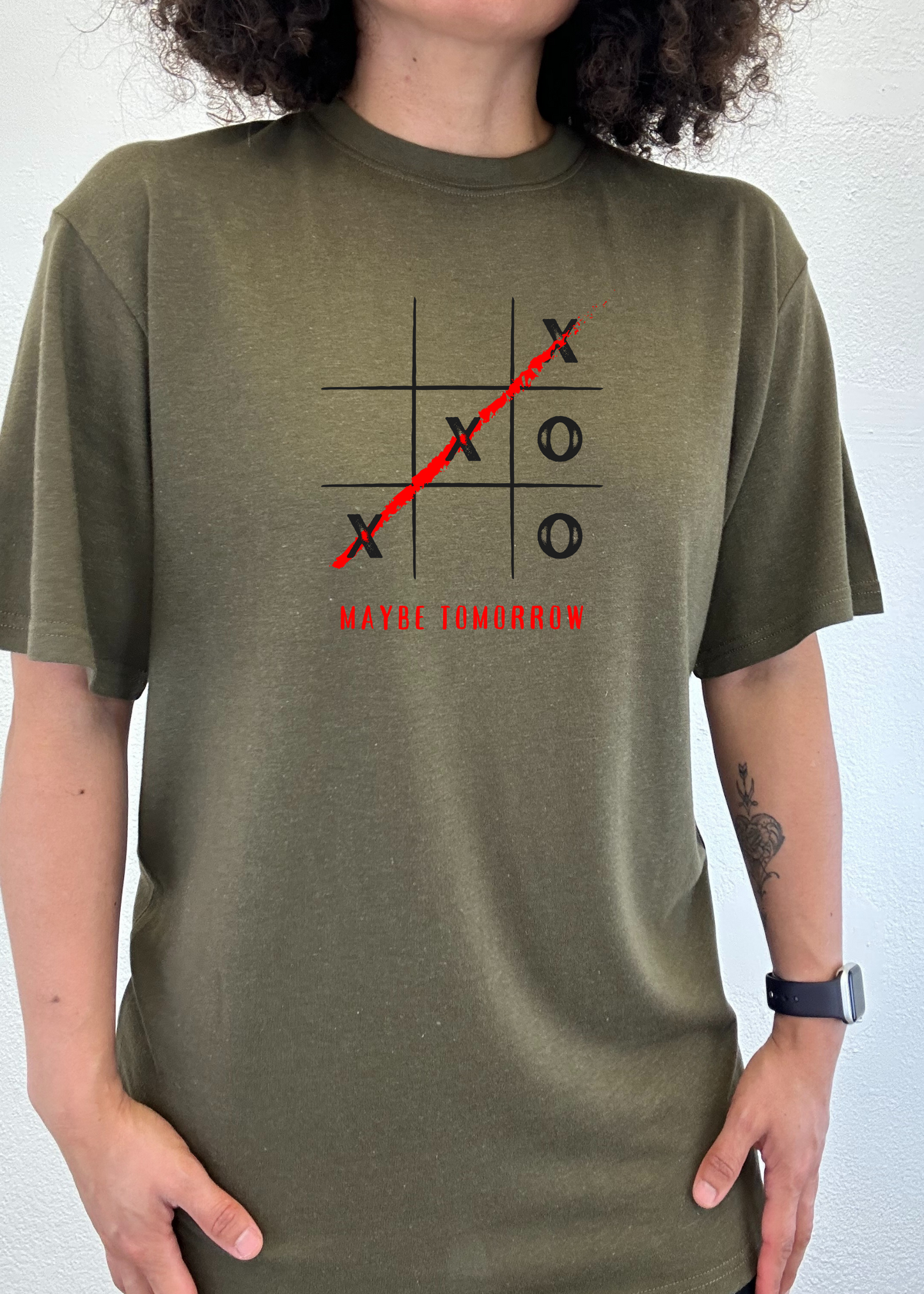 Maybe Tomorrow bamboo/cotton graphic tee in olive with tic-tac-toe grid and red diagonal on Tampa Home & Garden Store