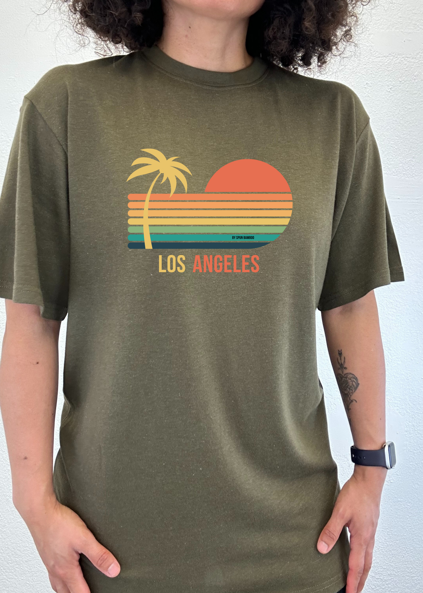 Los Angeles unisex bamboo viscose cotton graphic tee in olive with palm tree sunset stripes on Tampa Home & Garden Store