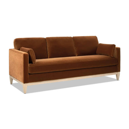 Knox Modern Farmhouse Sofa in warm brown velvet with light wood legs and three cushions on Tampa Home & Garden Store