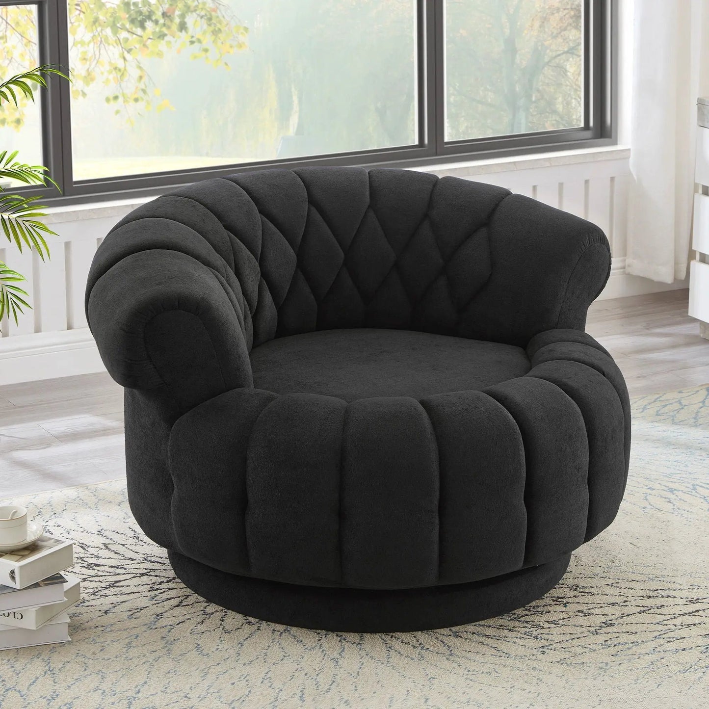 Black round tufted swivel accent chair with rotation in a cozy living room on Tampa Home & Garden Store