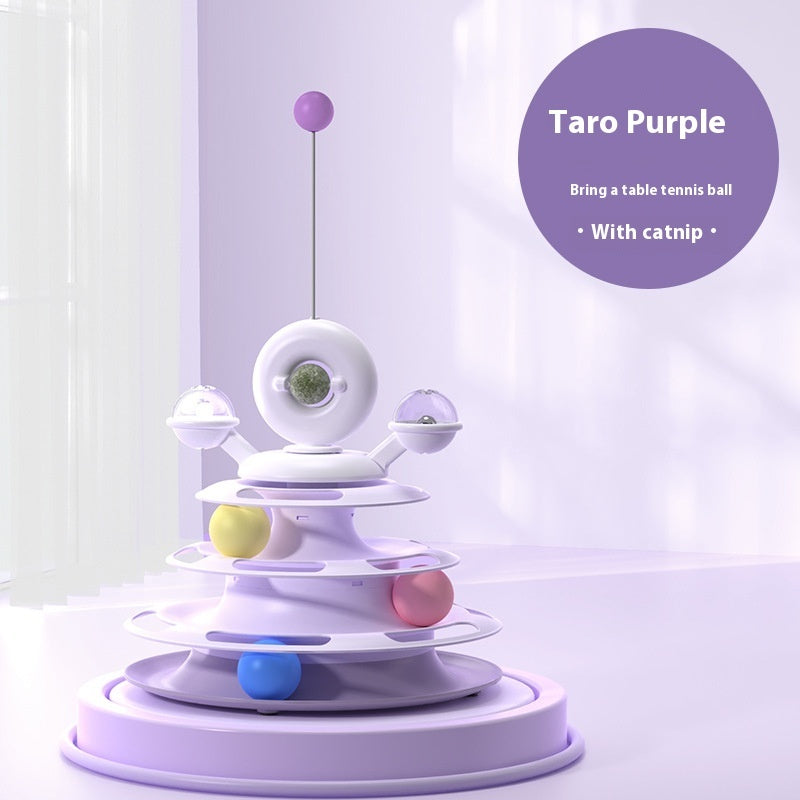 Four-level purple and white cat toy tower with rotating discs and colorful balls on Tampa Home & Garden Store