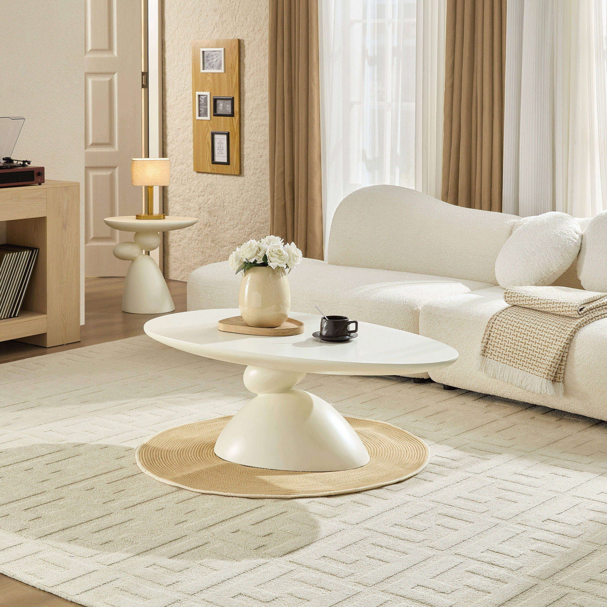 Lucky Stone Shaped End Table with Sculptural Base in ivory finish on Tampa Home & Garden Store