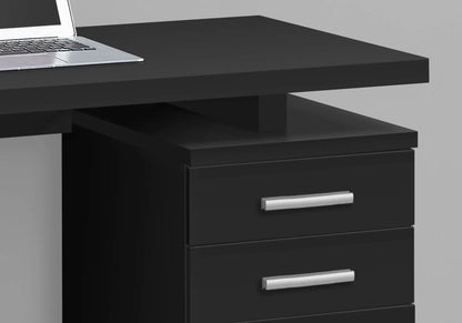 Computer desk with laptop on top and a 3-drawer pedestal in black with silver handles on Tampa Home & Garden Store