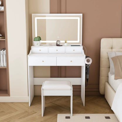 Modern makeup vanity set with power outlet, LED-framed mirror, drawers, and cushioned stool on Tampa Home & Garden Store