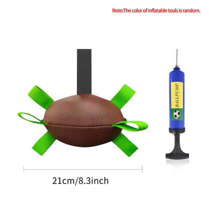 Interactive dog football toy with textured brown ball and neon green straps plus blue ball pump on Tampa Home & Garden Store