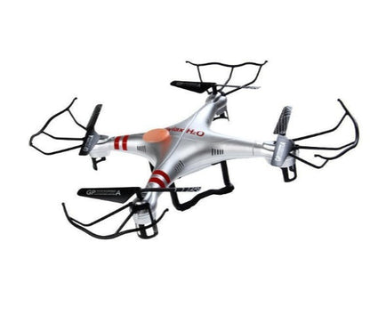 X52 Drone, silver quadcopter with orange accents and guards on Tampa Home & Garden Store