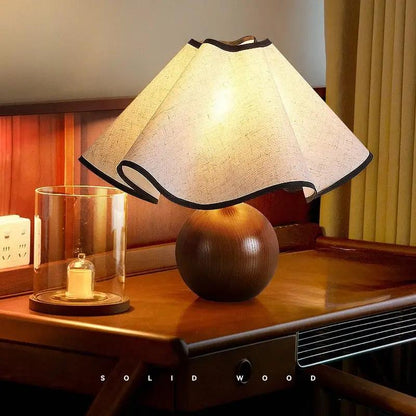 Retro solid wood table lamp with walnut spherical base and cream petal shade on Tampa Home & Garden Store
