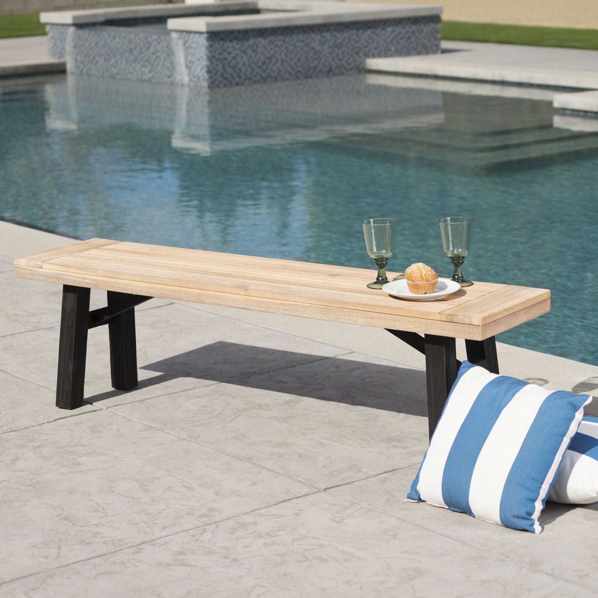 Outdoor bench with slat panel design and acacia wood frame on Tampa Home & Garden Store