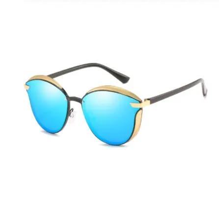 Metal polarized casual sunglasses with blue mirrored lenses, gold-tone rims, and black temples on Tampa Home & Garden Store