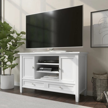 Warm Shaker white TV media stand with open shelves and doors supporting a Samsung TV on Tampa Home & Garden Store