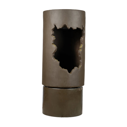 Outdoor fountain in brown with cylindrical form and jagged cutout, contemporary calming design on Tampa Home & Garden Store