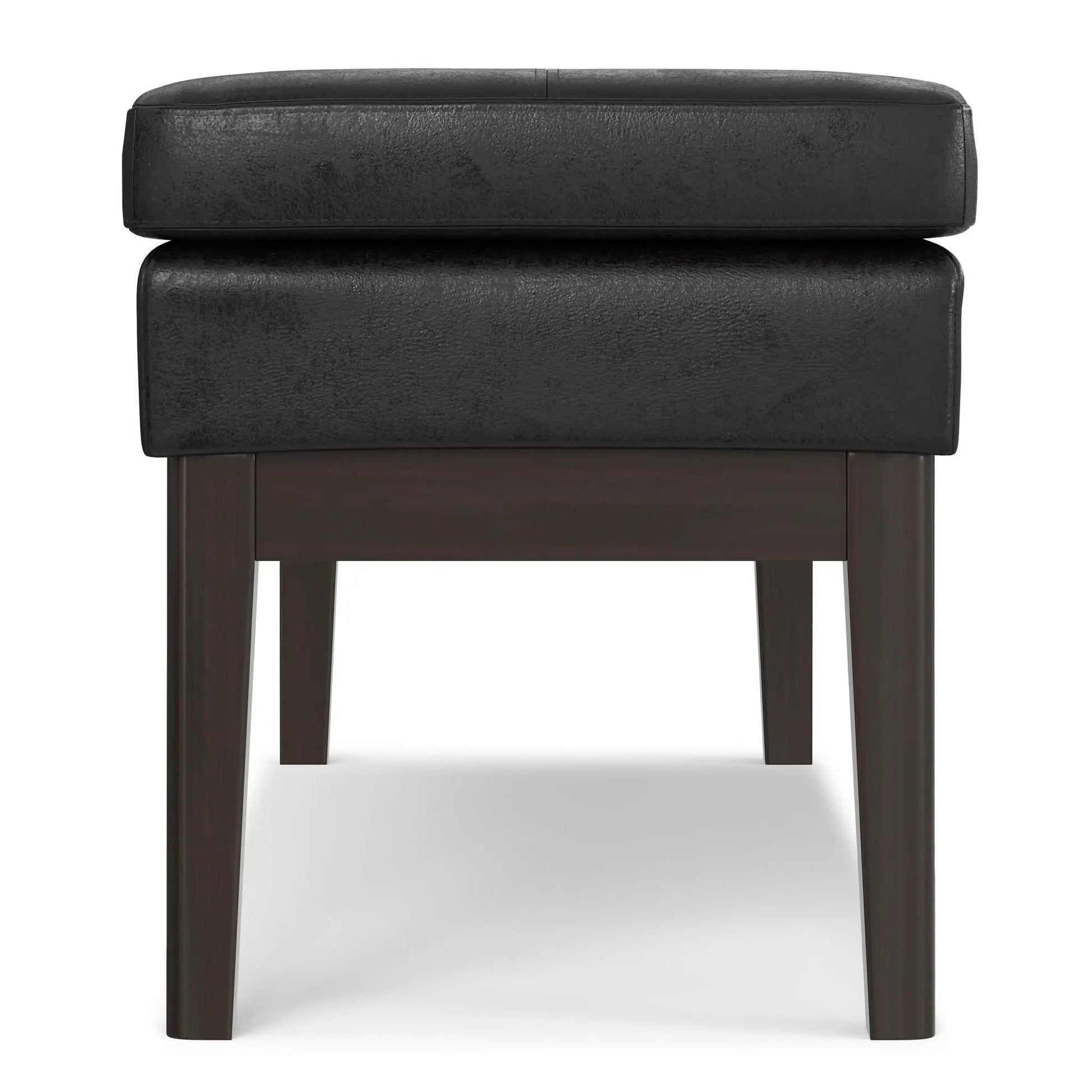 Carlson Ottoman Bench, black leather with dark wood legs, mid-century design on Tampa Home & Garden Store