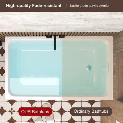 Modern glossy white freestanding acrylic bathtub with black faucet on Tampa Home & Garden Store