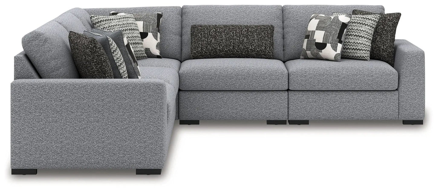 Bealton sectional sofa in gray textured fabric with assorted patterned cushions left chaise on Tampa Home & Garden Store