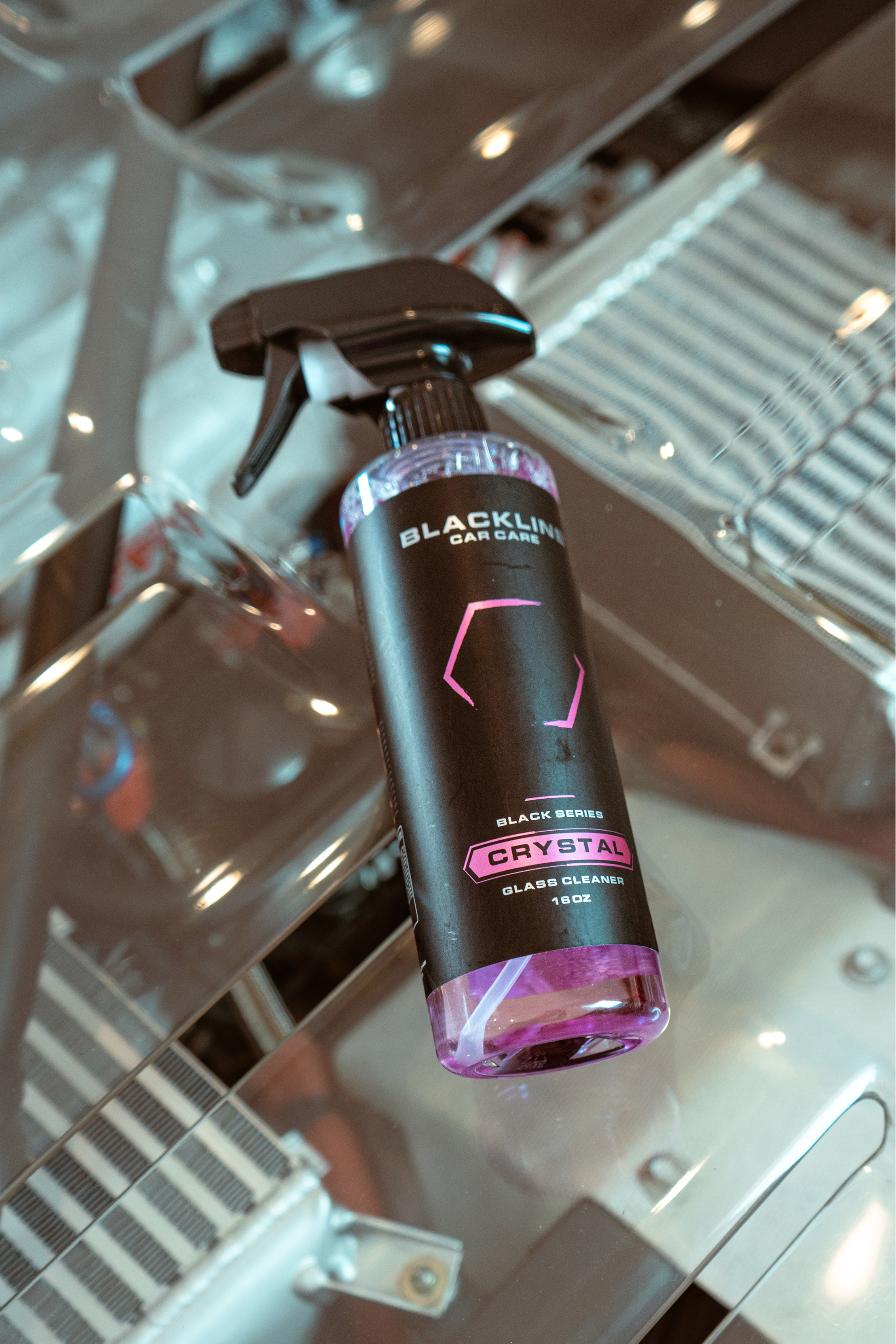 Crystal Glass Cleaner spray bottle Blackline Car Care, black bottle with pink accents on Tampa Home & Garden Store