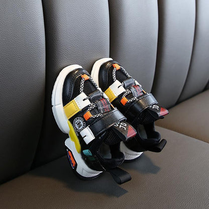 Stevvex baby walking sneakers pair non-slip breathable with black yellow orange accents on Tampa Home & Garden Store
