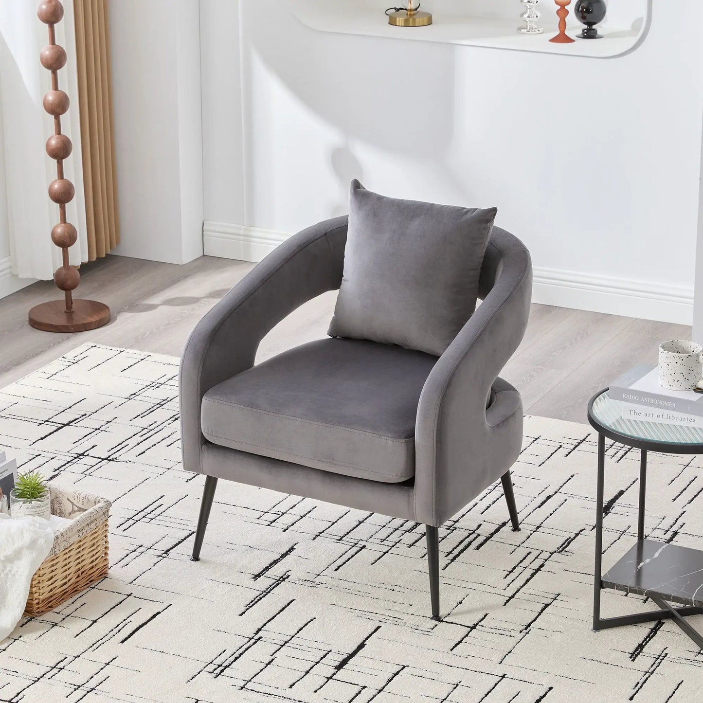 Open back accent chair in gray with curved arms and black legs by Unique Piece Furniture on Tampa Home & Garden Store