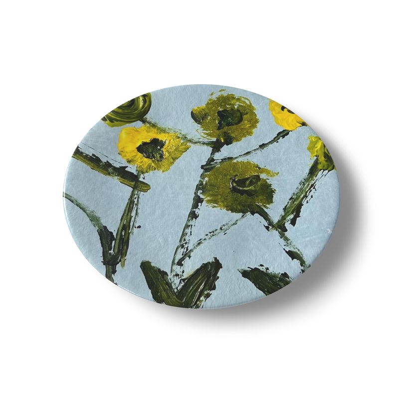 China plate Lemon Posey by Erin Donahue Tice, blue backdrop with yellow floral brushwork on Tampa Home & Garden Store