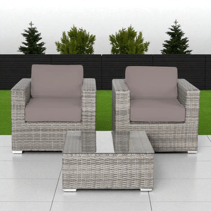 Wicker outdoor seating group with taupe cushions and glass-top coffee table; 2 chairs on Tampa Home & Garden Store
