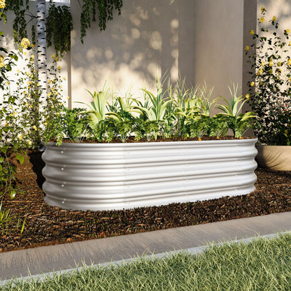 Heavy duty galvanized raised garden bed planter filled with soil and various green plants on Tampa Home & Garden Store