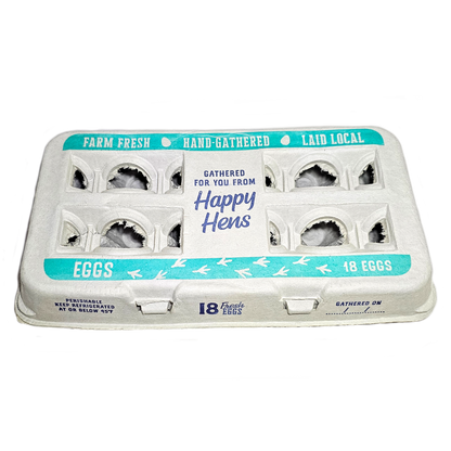 Egg carton cardboard with teal label 18 EGGS and Happy Hens branding on Tampa Home & Garden Store