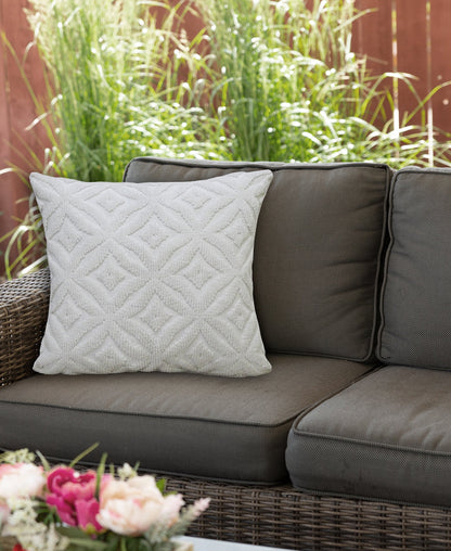 Vibhsa white ogee throw pillow 18x18 with textured diamond pattern on wicker outdoor sofa on Tampa Home & Garden Store