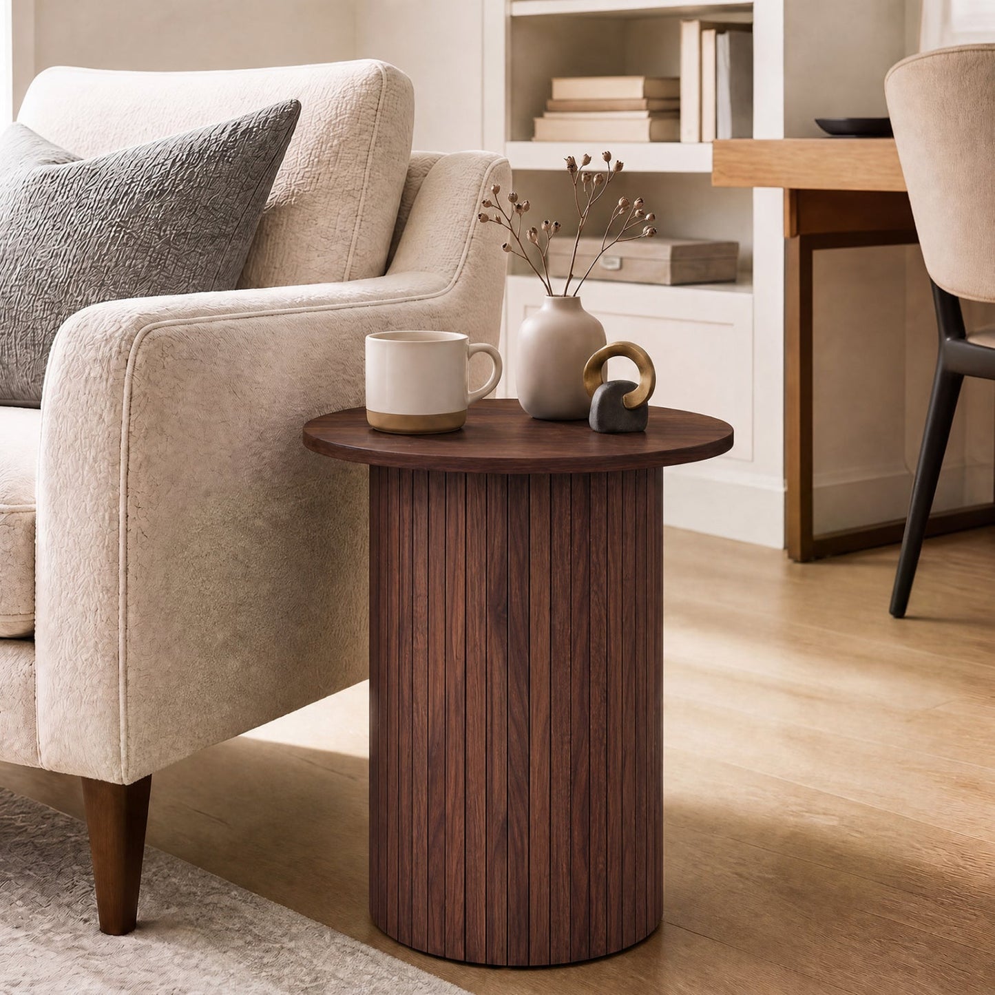 18-inch round fluted side table with pedestal drum base in dark wood beside a neutral sofa on Tampa Home & Garden Store