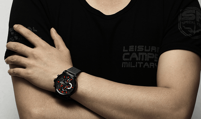 Men's Stevvex multifunction quartz watch with black stainless mesh band and red accents on Tampa Home & Garden Store