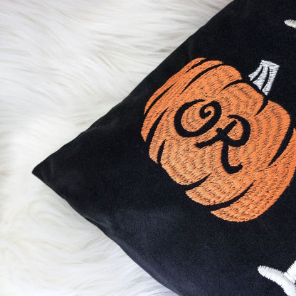 Halloween lumbar pillow embroidered Trick or Treat on black cushion with pumpkin design on Tampa Home & Garden Store