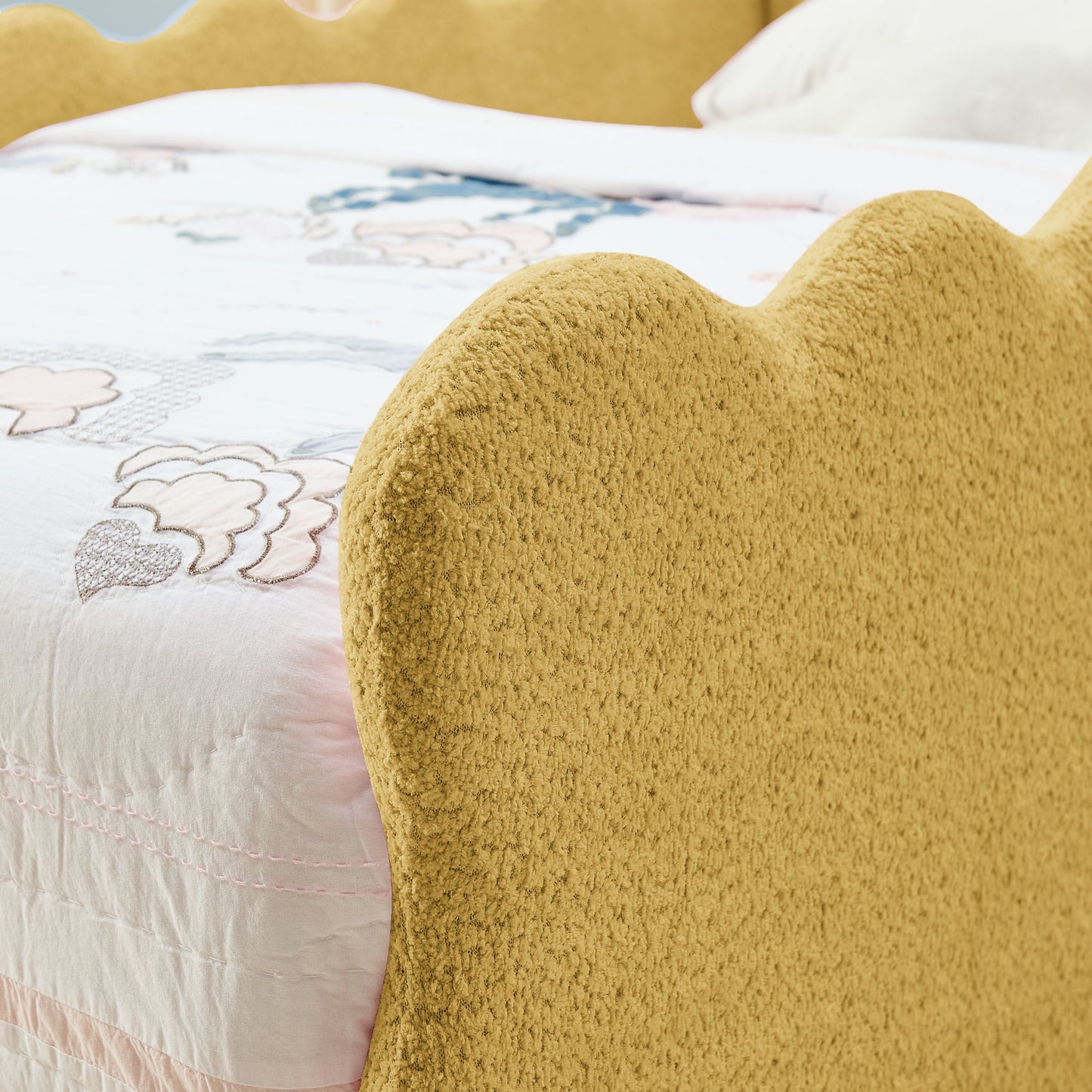 Twin size dinosaur-shaped kids bed with safety guardrails in mustard-yellow plush frame on Tampa Home & Garden Store