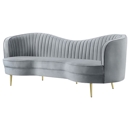 Reigha upholstered gray stationary sofa with channel-tufted backrest and curved silhouette on Tampa Home & Garden Store