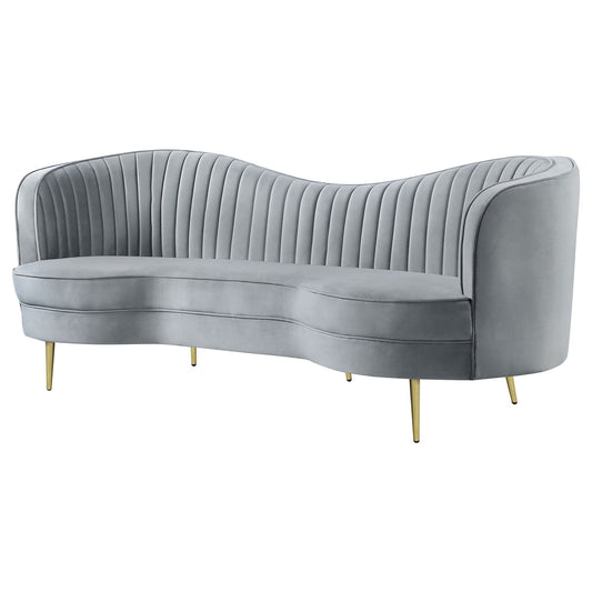 Reigha upholstered gray stationary sofa with channel-tufted backrest and curved silhouette on Tampa Home & Garden Store