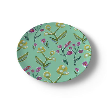Honeysuckle china plate by Erin Donahue Tice with teal background and yellow pink floral motifs on Tampa Home & Garden Store