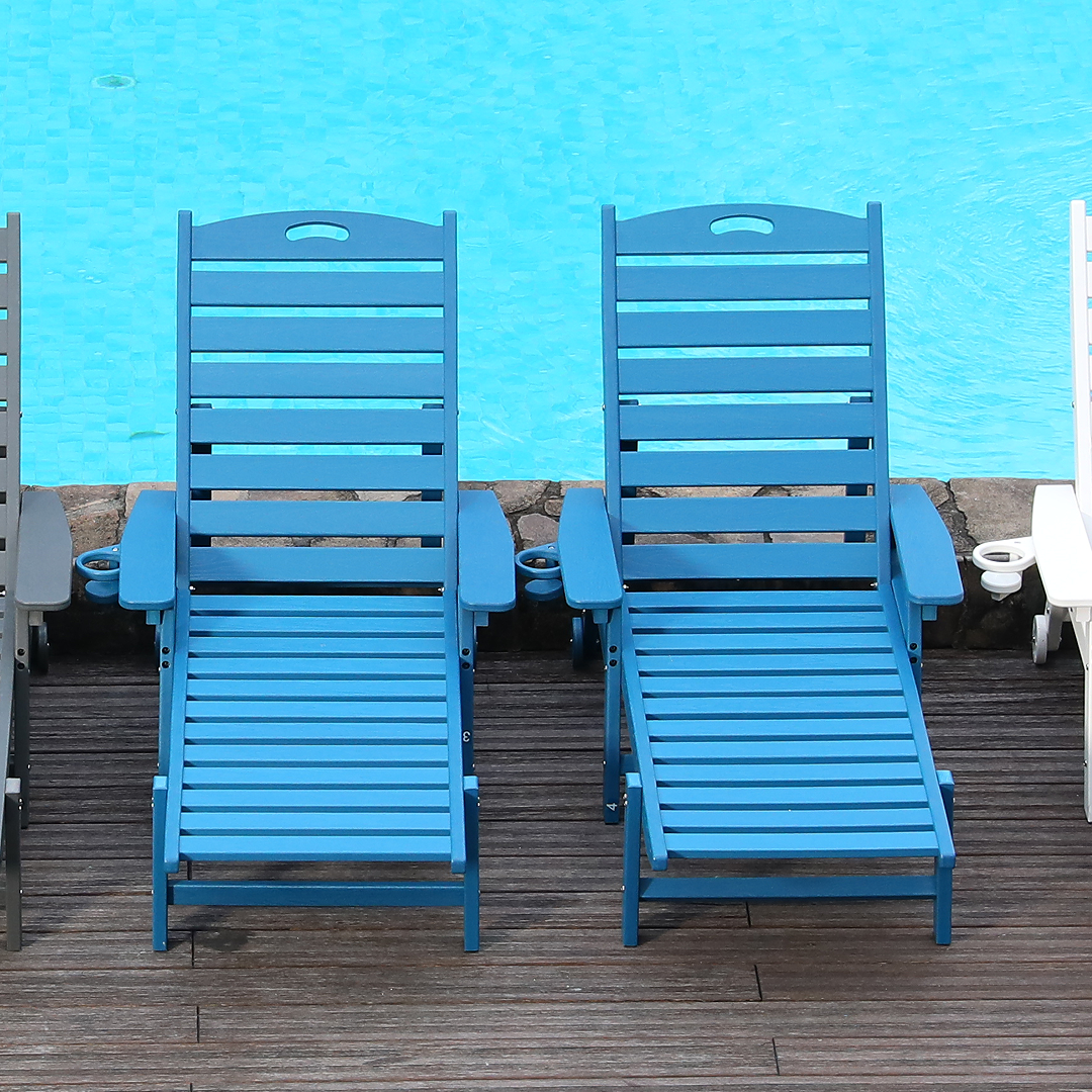 HDPE chaise lounge chairs with adjustable backrests in blue, pair on a wood deck by a pool on Tampa Home & Garden Store