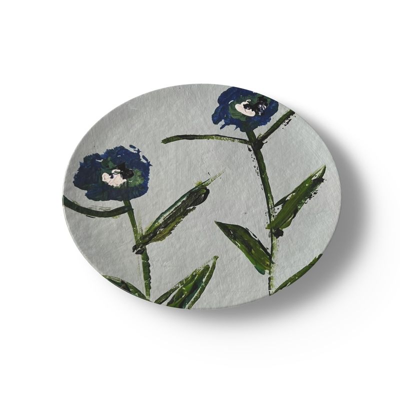 China plate featuring blue and teal posey flowers with green stems on a light background on Tampa Home & Garden Store