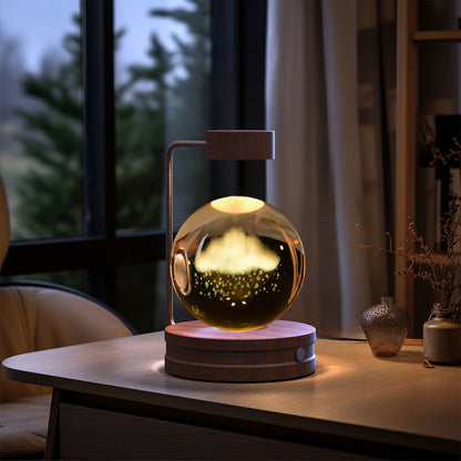 Crystal Ball Cosmic Dinosaur indoor night light on wooden base with warm USB glow on Tampa Home & Garden Store