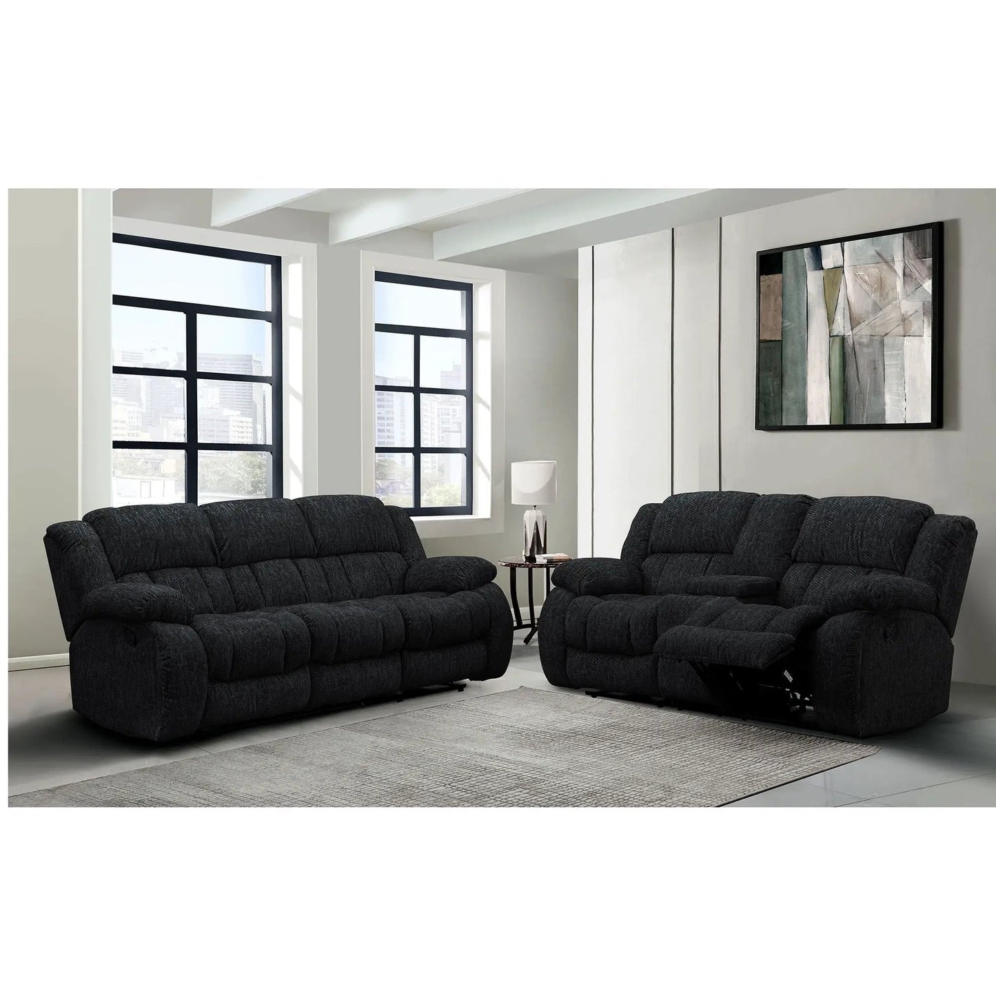 Stonic reclining sofa set in dark charcoal fabric with a modern design in a bright living room on Tampa Home & Garden Store