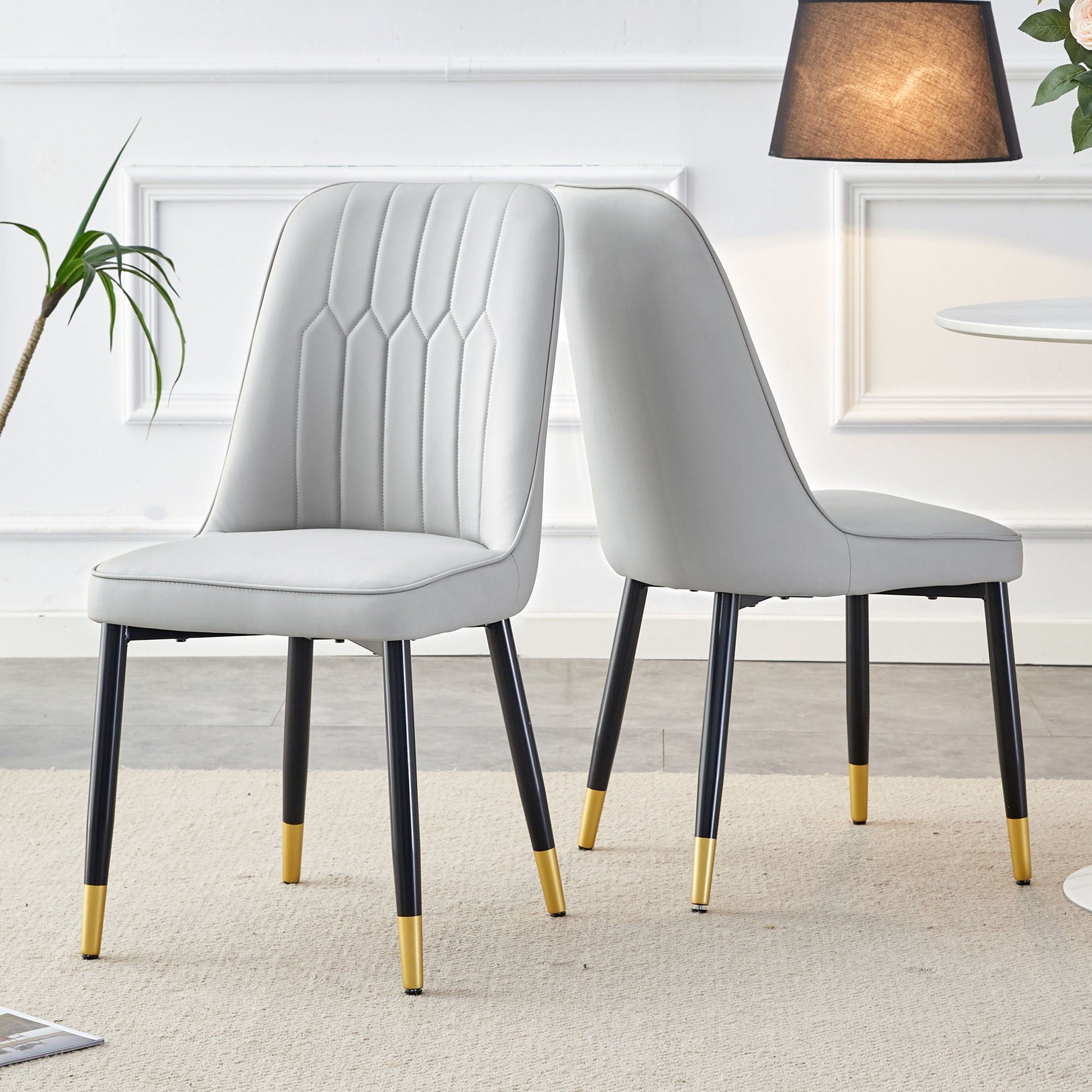 Modern chair with metal legs in light gray upholstery, pair of kids chairs on Tampa Home & Garden Store