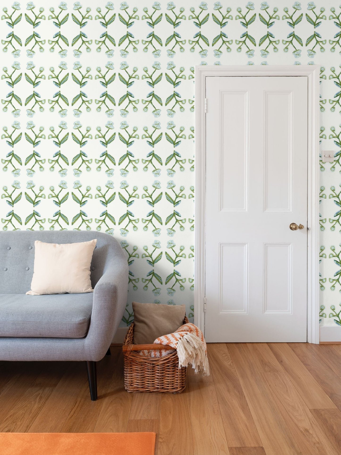 Antonia Wallpaper by Erin Donahue Tice in blue and green, botanical repeat pattern on wall on Tampa Home & Garden Store