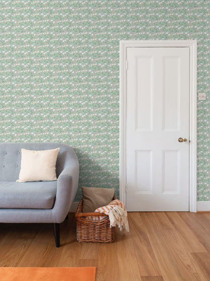 Sydney Wallpaper Moss repeat pattern with green floral stems and blossoms on gray-green backdrop on Tampa Home & Garden Store