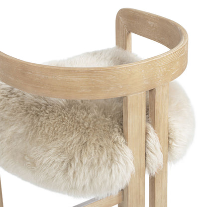 Low back counter stool with sheepskin fur seat, light brown wood frame, counter height 24–27 in on Tampa Home & Garden Store