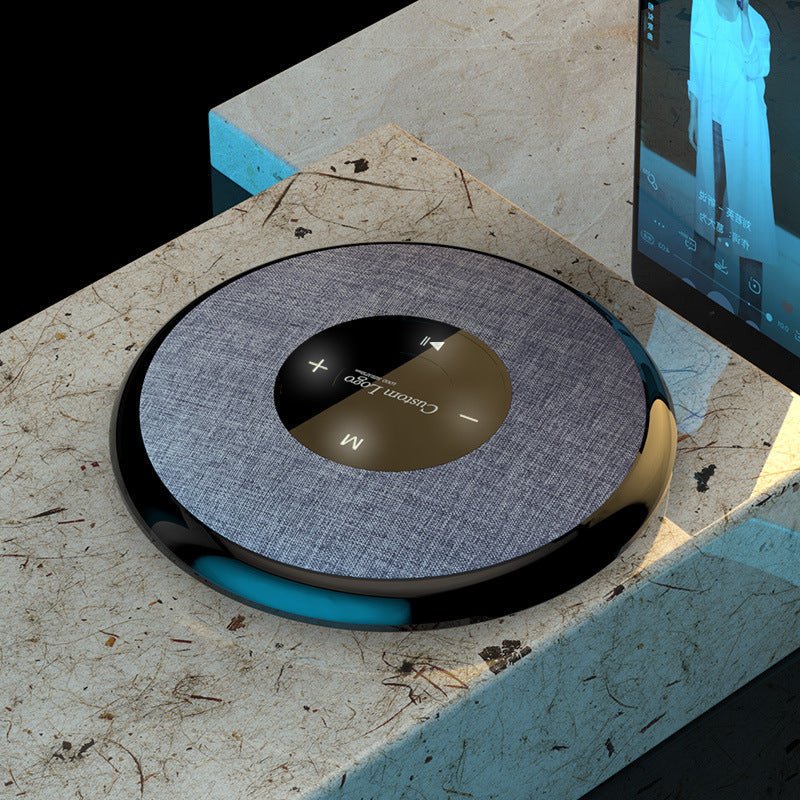 Waterproof Bluetooth speaker with gray fabric top and black glossy rim by My Store on Tampa Home & Garden Store