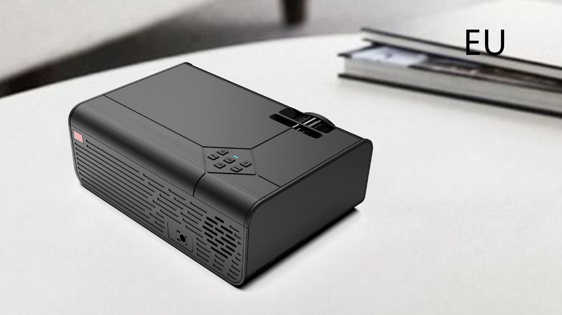 Home Office Android Smart HD Micro Joy Projector compact black projector on a white desk on Tampa Home & Garden Store