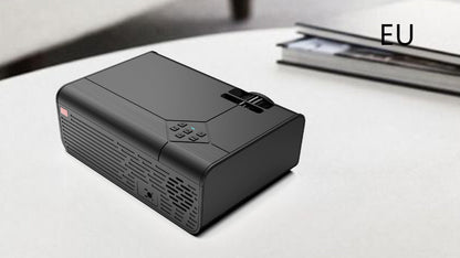 Home Office Android Smart HD Micro Joy Projector compact black projector on a white desk on Tampa Home & Garden Store